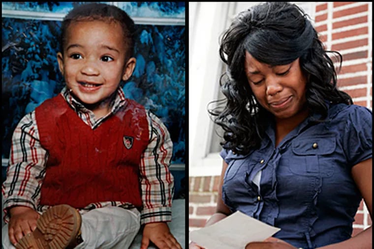 Brandon Thompson,4, left, was shot and killed in Camden Monday night.  His mother, Stephanie, right, weeps. (Laurence Kesterson / Inquirer)