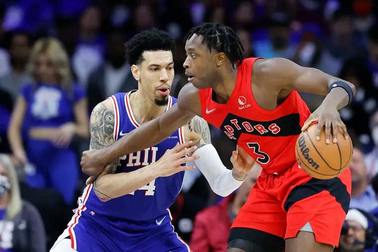 Toronto Raptors forward OG Anunoby  is guarded by the Sixers' Danny Green during Game 1 on Saturday.