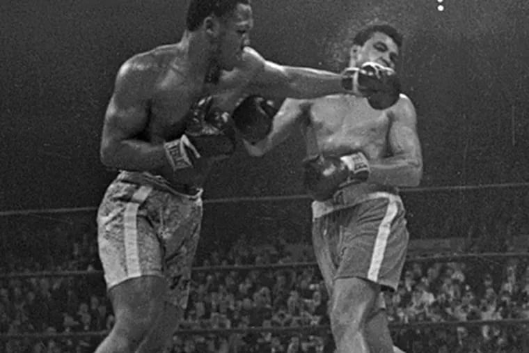 Joe Frazier defeated Muhammad Ali by unanimous decision in a heavyweight title fight in 1971. (AP file photo)