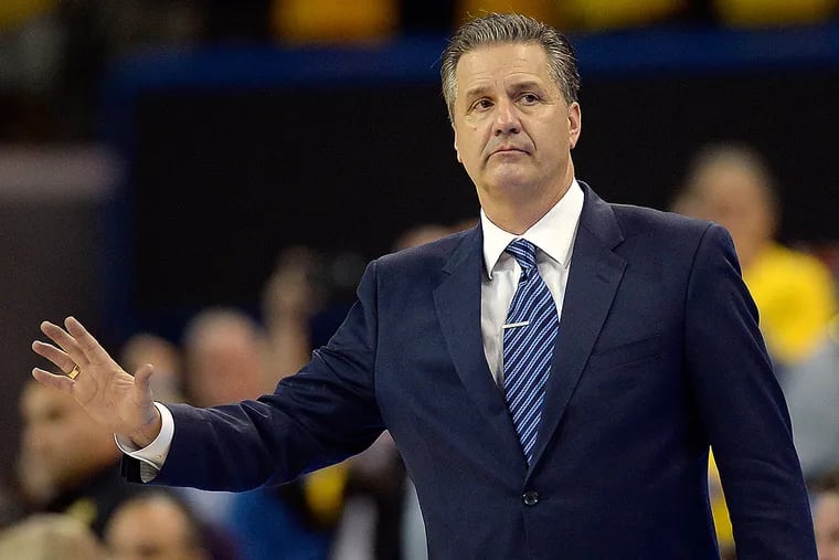 Kentucky Wildcats head coach John Calipari reacts during the second half against the UCLA Bruins at Pauley Pavilion.