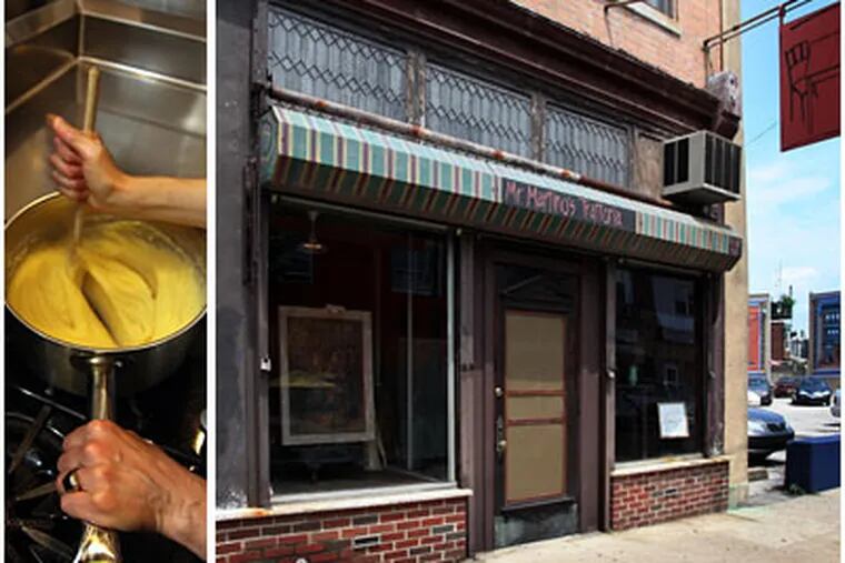 Mr Martino’s, housed in a 19th-century hardware store, offers a refuge from the bustle of East Passyunk Avenue. Co-owner Maria Farnese
stirs polenta in the kitchen (left). "I'm a cook, not a chef," she says. "I cook everything during the day, then reheat it for service." (LAURENCE KESTERSON /
Staff Photographer)