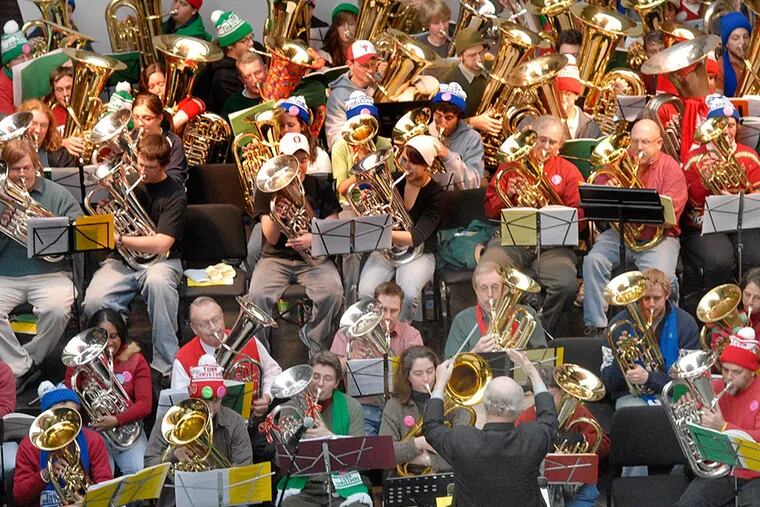 TubaChristmas at the Kimmel, 100-plus locals wailing on tubas, euphoniums, and sousaphones. APRIL SAUL / Staff Photographer