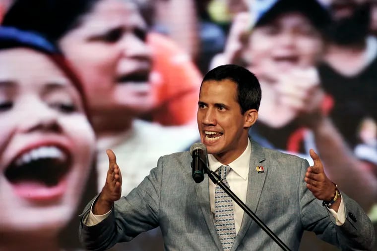 Venezuela's self-proclaimed president Juan Guaido speaks during a meeting with university students at the Central University of Venezuela, in Caracas, Venezuela, Friday, Feb. 8, 2019. Guaido declared himself interim president in Venezuela, a move recognized by several dozen countries, but President Nicolas Maduro is refusing to relinquish power.