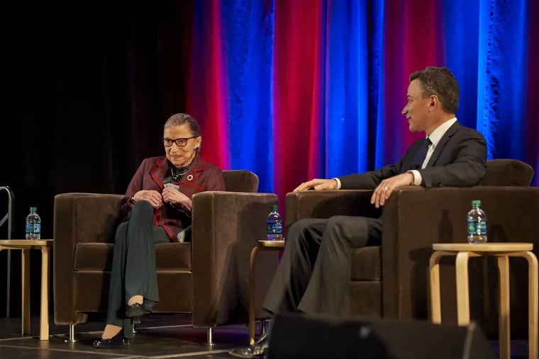 Ruth Bader Ginsburg and Jeffrey Rosen chat at the National Constitution Center in February 2012.