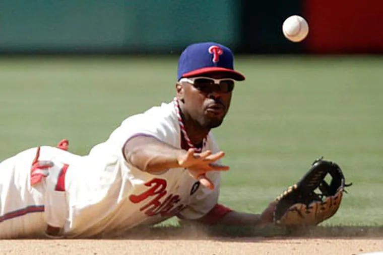 The Phillies would likely miss Jimmy Rollins' defensive skills if they let him walk after the season. (David Maialetti/Staff Photographer)