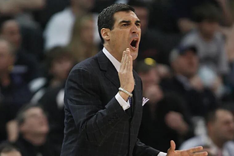 "I don't think we as a team feel as bad about last season as everybody else does," Jay Wright said yesterday. (AP Photo/Winslow Townson)