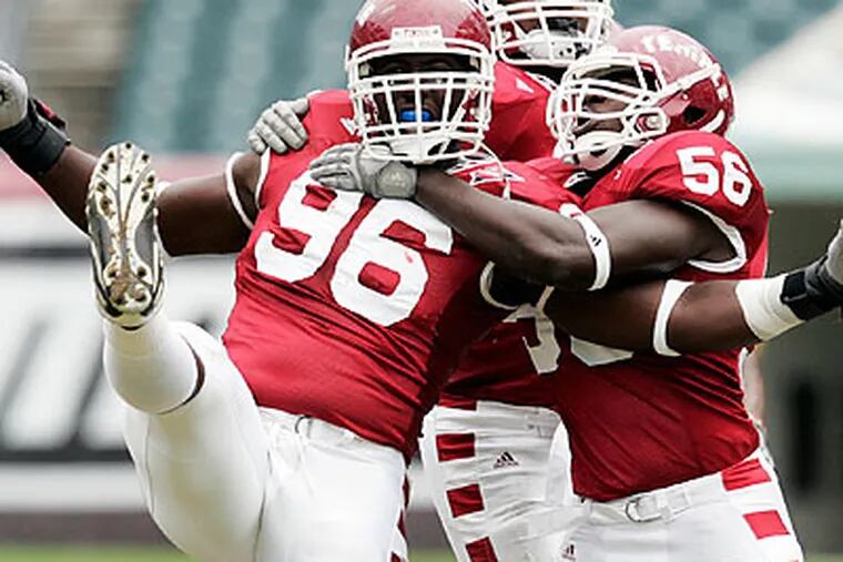 Temple's Muhammad Wilkerson (96) could be a first-round draft pick. (Tom Mihalek/AP file photo)