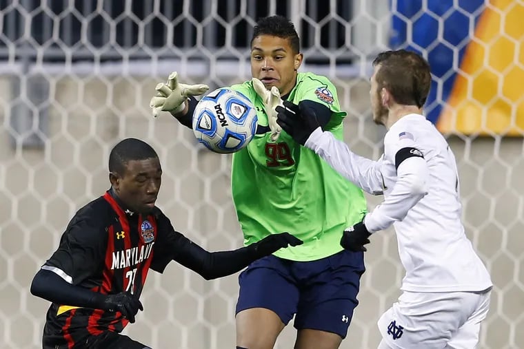 Zack Steffen, center, making a save for Maryland during the 2013 NCAA men's soccer championship game at PPL Park.