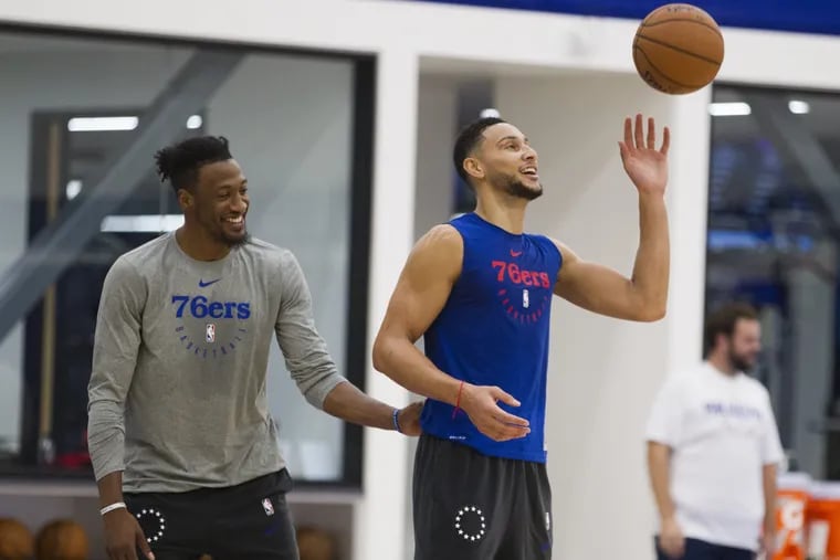 Robert Covington, left, and Ben Simmons of the Sixers at the end of practice on Oct. 11, 2018.