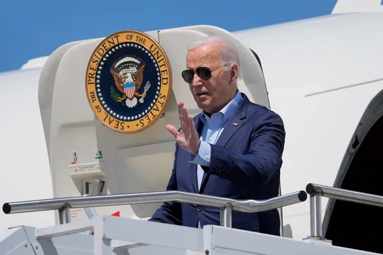President Joe Biden waves as he arrives on Air Force One at Wilkes-Barre Scranton International Airport Tuesday.
