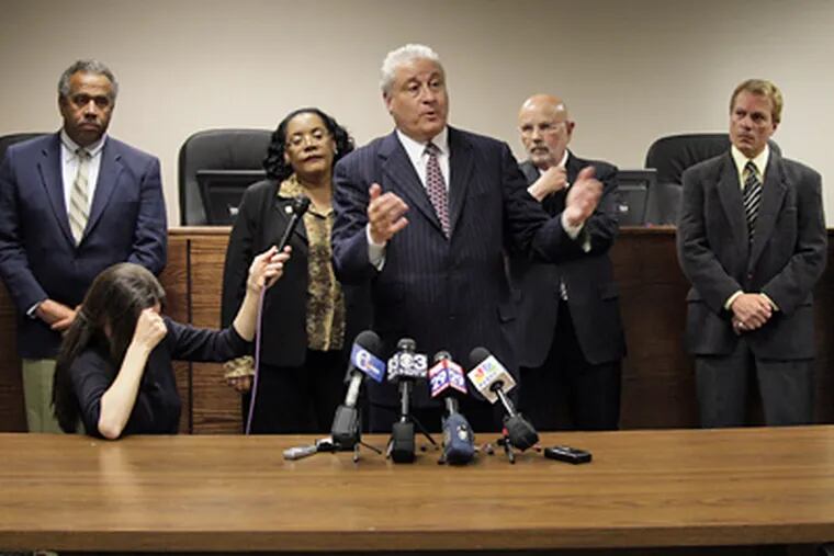 BRT member Russell Nigro, center, talks to reporters this afternoon about Mayor Nutter's demand that they resign. Also present are BRT members (left to right) Robert NC Nix III, Charlesretta Meade, Harvey Levin and James Dintino.  (Laurence Kesterson / Staff Photographer)