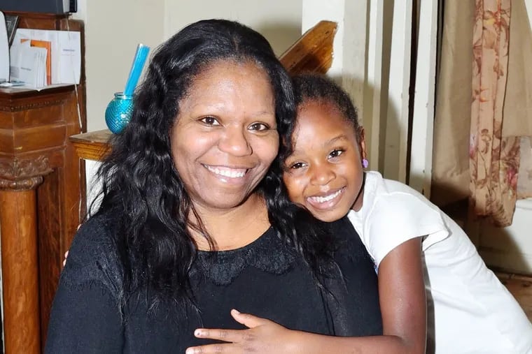 Erika Ford and her daughter, Jordin, at their Nicetown home on Wednesday, August 13, 2014.  C.F. Sanchez / Staff Photographer