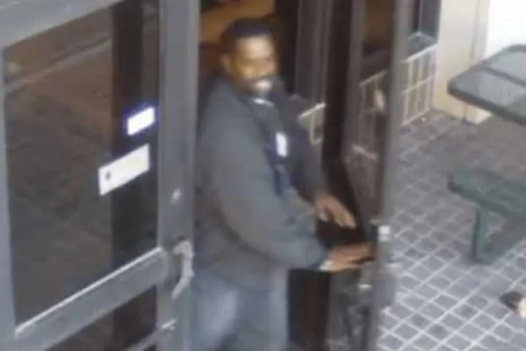 Police have released surveillance video of the suspect in an on-campus assault and robbery of a Temple University professor.