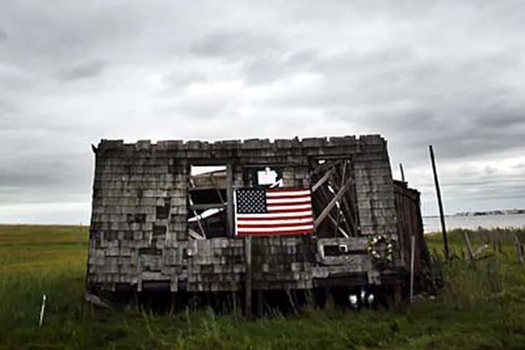 The duck-hunting cabin, near the causeway to Long Beach Island, has inspired paintings, photographs, and even a Facebook page. (Lawrence Kesterson / Staff Photographer)