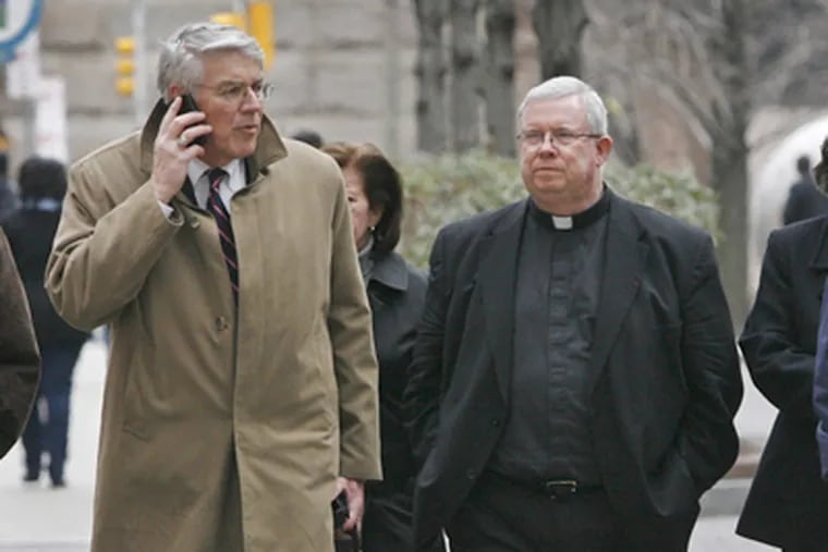 Msgr. William J. Lynn (right), pictured with Thomas A. Bergstrom, is charged with child endangerment. (Alejandro A. Alvarez / Staff Photographer)