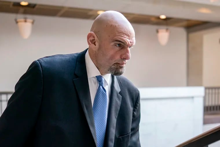 Sen. John Fetterman, D-Pa., leaves an intelligence briefing in Washington in February. He returns April 17 after treatment for depression.