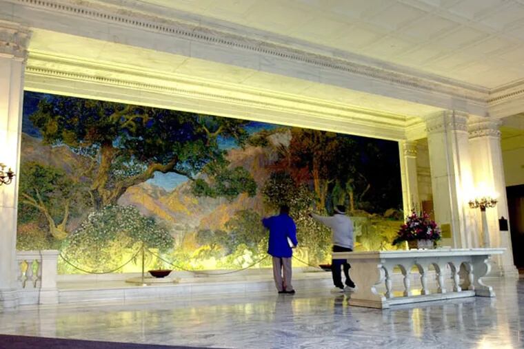 The “Dream Garden” was constructed by artist Maxfield Parrish in collaboration with Louis Comfort Tiffany for Cyrus Curtis’ 1910 headquarters. (CHARLES FOX/Staff Photographer)