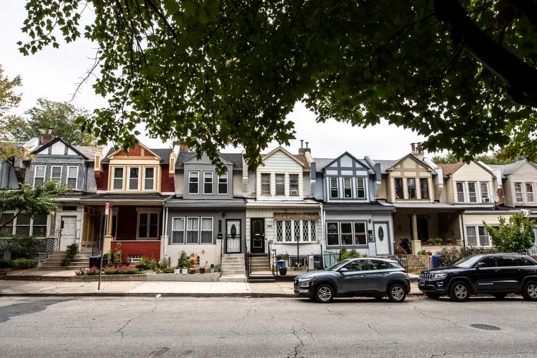 Row homes are shown along Springfield Avenue in Southwest Philadelphia.