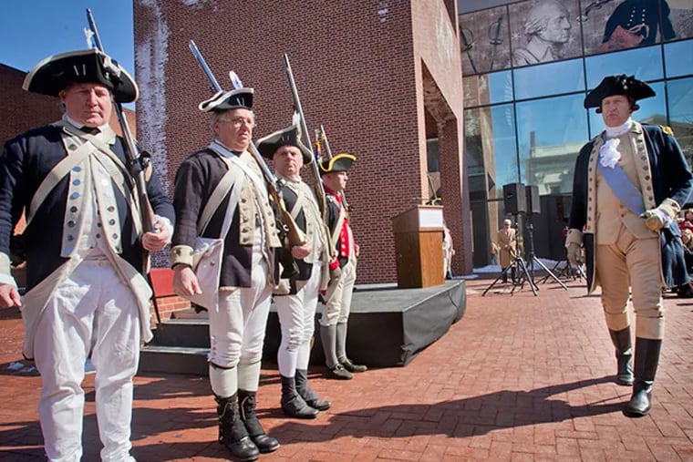 American revolutionary war re-enactors during ceremony announcing the construction of the Museum of the American Revolution.  Opening salvo for Museum of the American Revolution held at 3rd and Chestnut St. in Philadelphia future home of this museum. Photograph from Wednesday morning March 5, 2014. ( ALEJANDRO A. ALVAREZ / STAFF PHOTOGRAPHER )