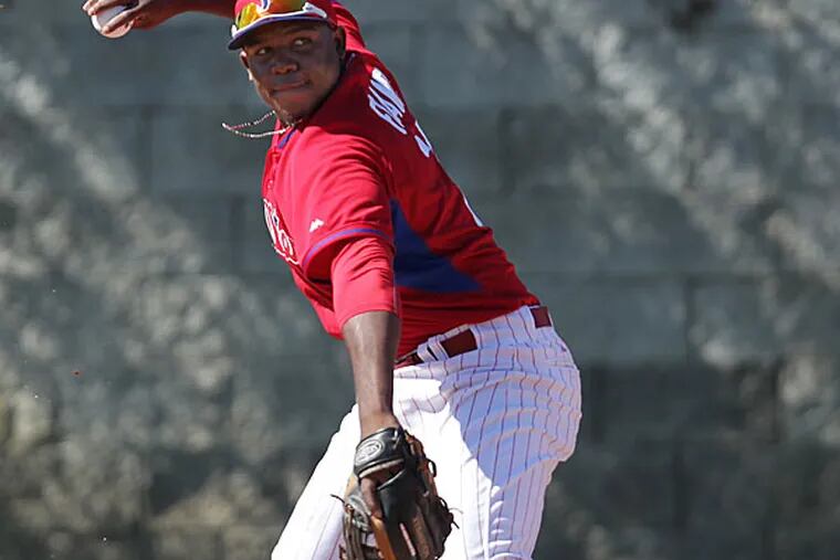 Maikel Franco throws after he fields a grounder during spring training. (David Maialetti/Staff Photographer)
