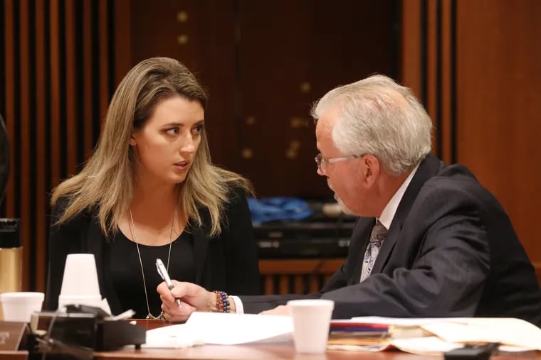 Kate McClure, 29, charged with theft by deception in the $400K GoFundMe scam, with her lawyer Jim Gerrow Jr., pleads guilty before State Superior Court Judge Christopher Garrenger in Burlington County Courthouse, Mt. Holly, NJ Monday April 15, 2019
