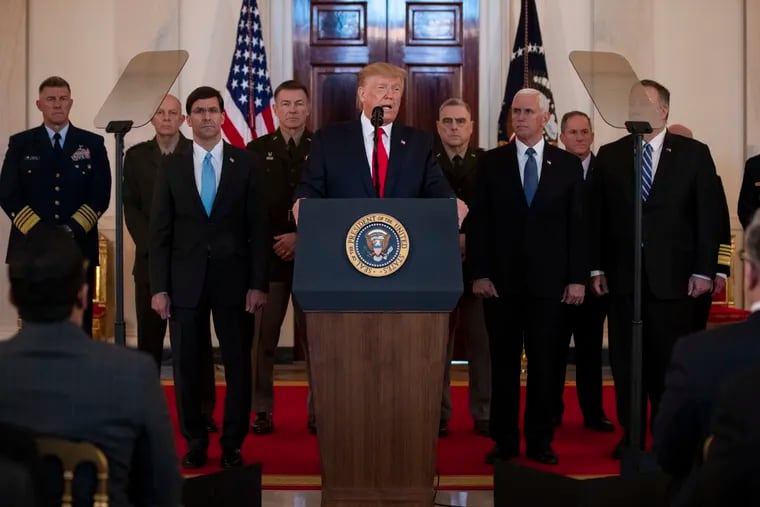 President Donald Trump addresses the nation from the White House on the ballistic missile strike that Iran launched against Iraqi air bases housing U.S. troops as Secretary of Defense Mark Esper, Chairman of the Joint Chiefs of Staff Gen. Mark Milley, Vice President Mike Pence, and Secretary of State Mike Pompeo, and others look on.