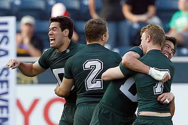 Dartmouth players celebrate after winning the men's 2011 USA Sevens Collegiate Rugby Championship. (Yong Kim/Staff Photographer)