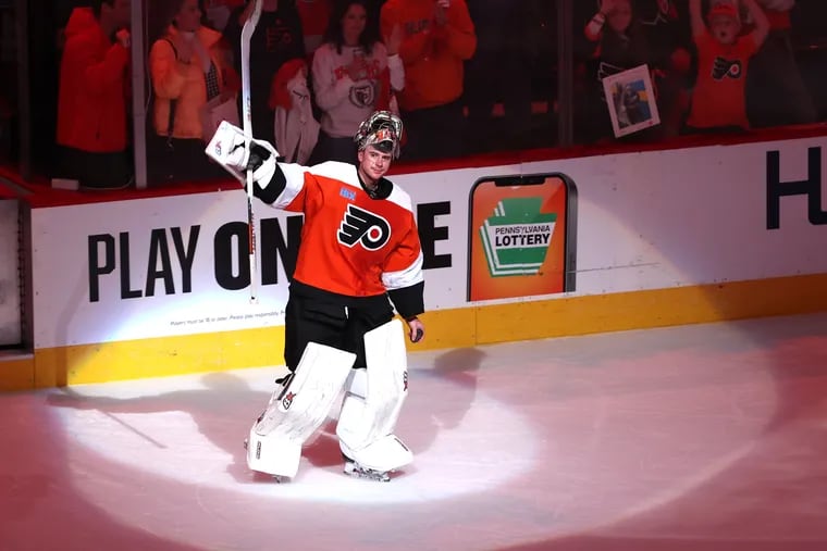 Goalie Carter Hart of the Flyers is introduced as the player of the game after his shutout against Vancouver on Tuesday.