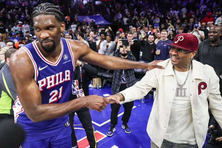 Sixers center Joel Embiid and franchise legend Allen Iverson greet after the Sixers defeated the Thunder at the Wells Fargo Center on Tuesday. The game was the first for Embiid in a return from a knee injury.