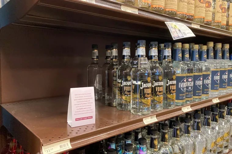 A shelf is emptied of Russian Standard vodka at a Fine Wine & Good Spirits liquor store in Dresher, Pa., on Monday, Feb. 28, 2022.