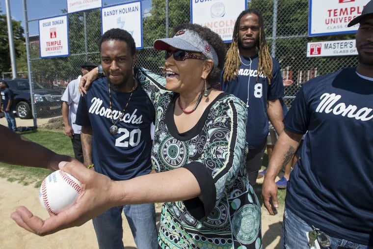 A celebration of the Anderson Monarchs, past, present and future, was held at Anderson on June 10, 2017. Sportswriting legend, Claire Smith, 2nd from left, who broke barriers of race and gender in her career, threw out the honorary first pitch. Smith traveled with the Monarchs in 1997, while working for the New York Times. She is surrounded by members of the ’97 Monarchs after throwing out the first pitch. Marquis Harris is left and D’Var Brown is 3rd from left.