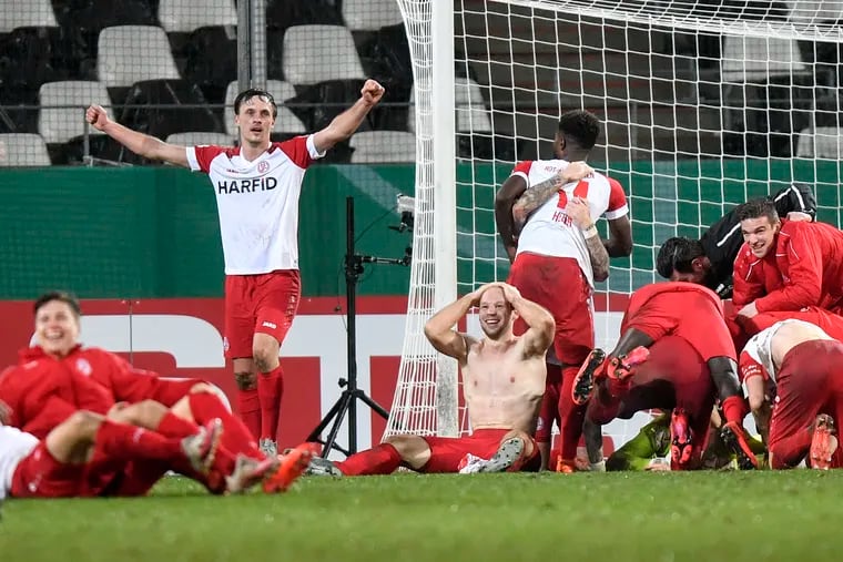 Fourth-tier Rot-Weiss Essen stunned Bundesliga giant Bayer Leverkusen in the fourth round of the German Cup to earn a berth in the quarterfinals.