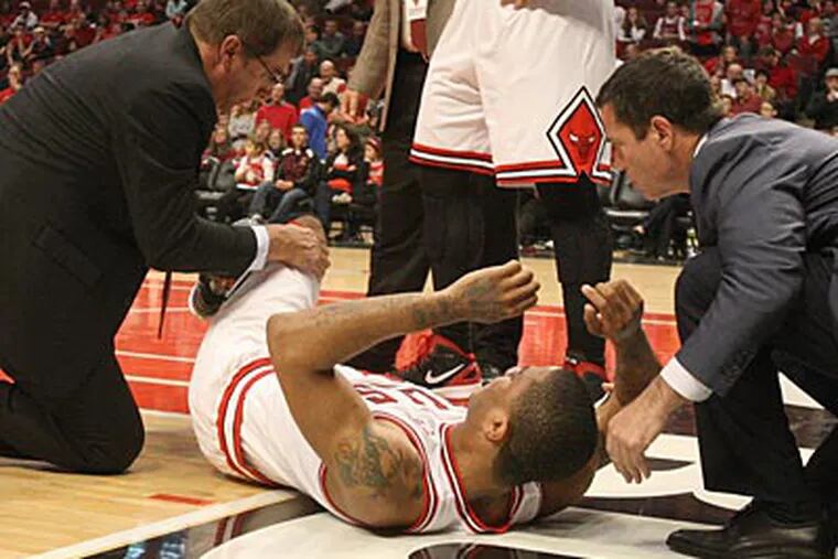Bulls point guard Derrick Rose tore his ACL in Game 1 and will miss the rest of the playoffs. (Ron Cortes/Staff Photographer)