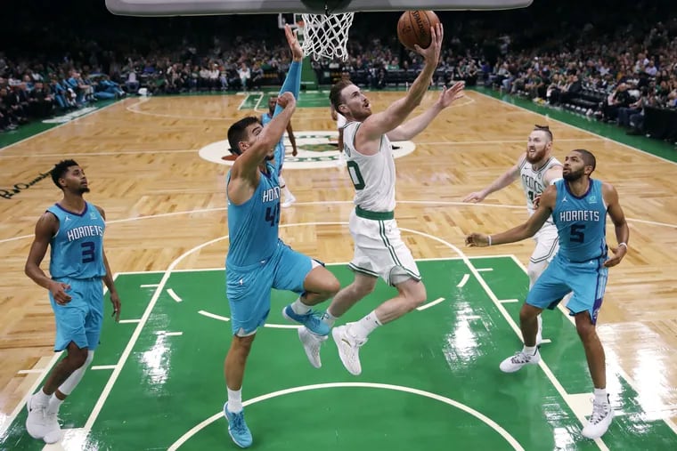 Celtics forward Gordon Hayward drives to the basket against the Hornets during a preseason game.
