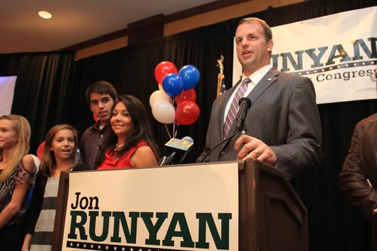 Republican Jon Runyan accepts victory in his race for congress with his family on stage at the Westin in Mount Laurel, November 6, 2012. (DAVID M WARREN/Staff Photographer)