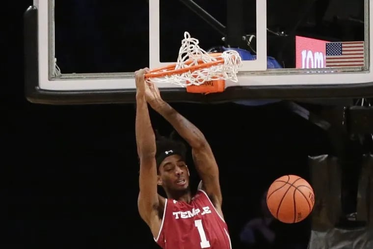 Temple's Quinton Rose (1) dunks the ball in front of California's Justice Sueing (10) during the first half of an NCAA college basketball game in the consolation round of the Legends Classic tournament Tuesday, Nov. 20, 2018, in New York. (AP Photo/Frank Franklin II)
