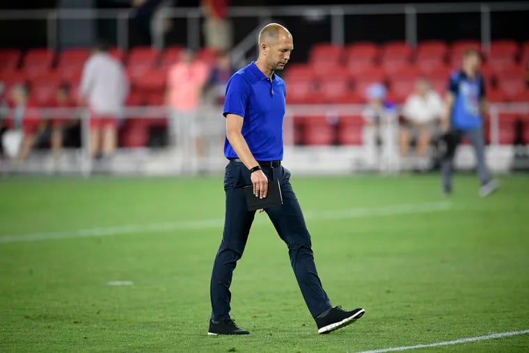 U.S. coach Gregg Berhalter walks off the field after the team's loss to Jamaica.