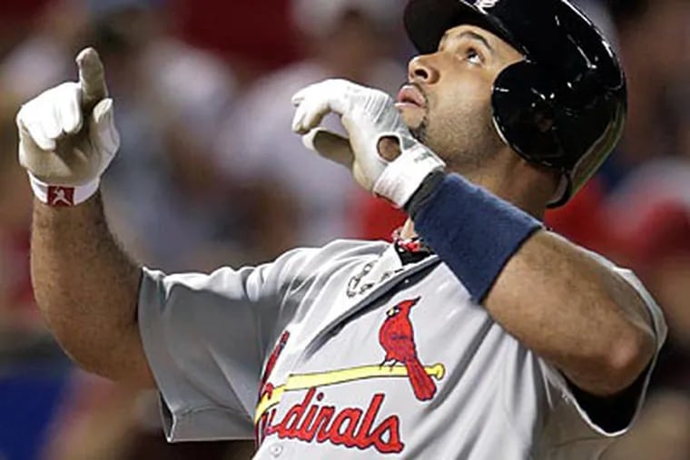 Albert Pujols will head to the American League after signing a 10-year deal with the Angels. (Charlie Riedel/AP)