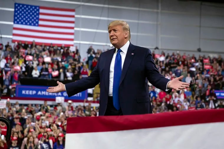 In this Jan. 14, 2020, photo, President Donald Trump arrives at UW-Milwaukee Panther Arena to speak at a campaign rally in Milwaukee. Trump's surrogates are fanning out across the country as part of an aggressive effort to stretch his appeal beyond the base of working-class white voters who propelled him to victory in 2016.