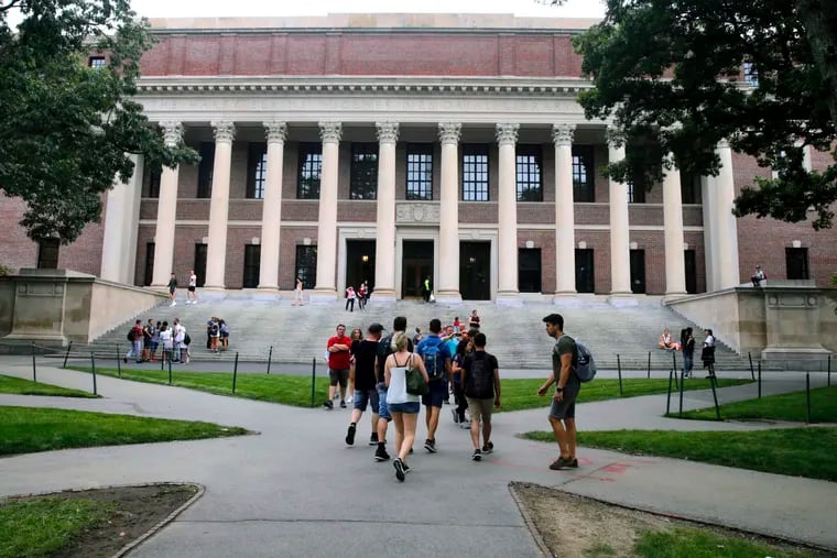 Harvard, pictured here, and MIT have sued the Trump administration over the rule barring international students from online-only classes.
