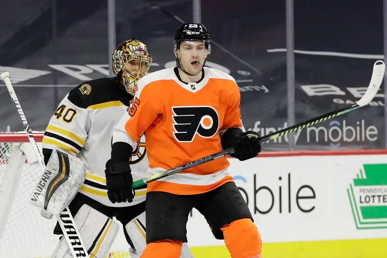 Flyers left winger James van Riemsdyk, parked in front of Boston Bruins goaltender Tuukka Rask in a Feb. 5 game, will be on the top line and the No. 1 power-play unit Thursday against the Rangers.