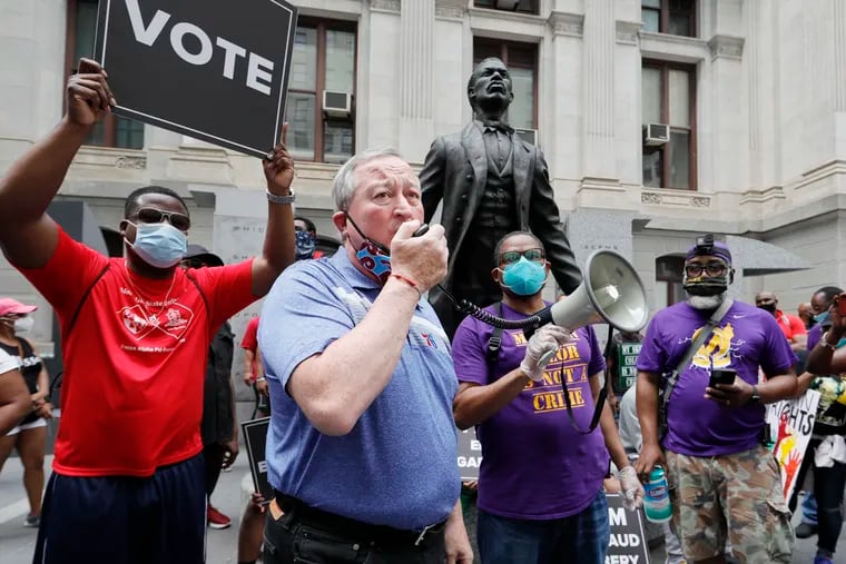 Philadelphia Mayor Kenney outside City Hall during racial justice protests last June. Kenney and City Council have homed in on racial inequities in public policy during budget negotiations with a greater emphasis than ever before.