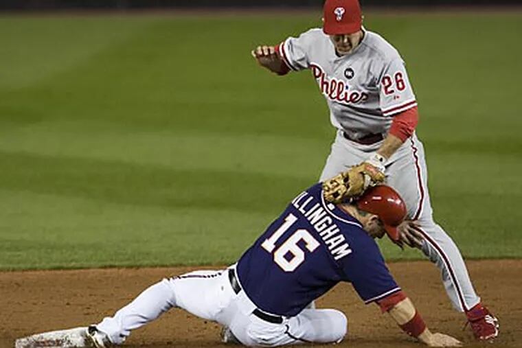 Washington's Josh Willingham beat Chase Utley's tag to steal second base in the second inning.