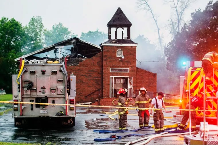 Firefighters and fire investigators respond to a fire at Mt. Pleasant Baptist Church Thursday, April 4, 2019, in Opelousas, La.