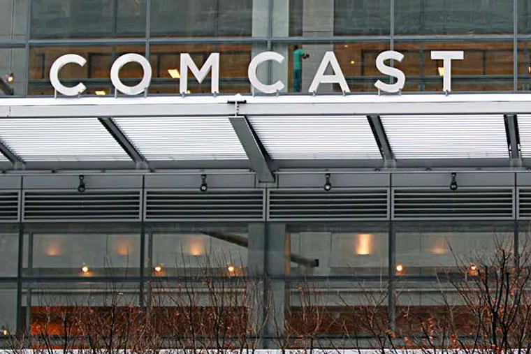 Comcast has spent more than $200 million to obtain required approvals from the government for merger. The cable giant's plan has met with continuous opposition. ( Yong Kim / Staff Photographer )