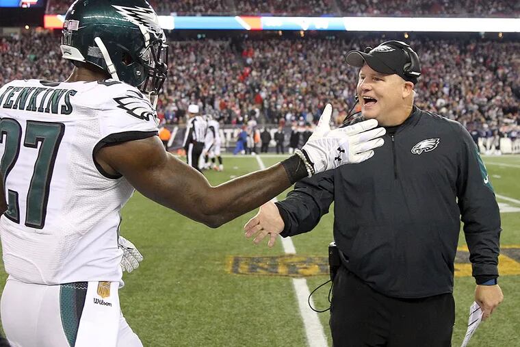 Malcolm Jenkins and Chip Kelly celebrate Jenkins' touchdown.