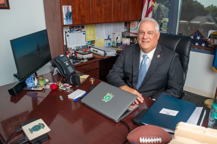 Bucks County District Attorney Matt Weintraub, seen here in his office in 2019, announced Friday that he plans to run for a county judgeship in the fall.