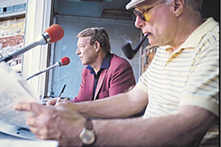 Harry Kalas and Richie Ashburn in the broadcast booth at Veteran's Stadium. (file photo)