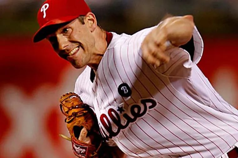 Cliff Lee struck out 10 and pitched eight scoreless innings on Saturday night. (Ron Cortes/Staff Photographer)