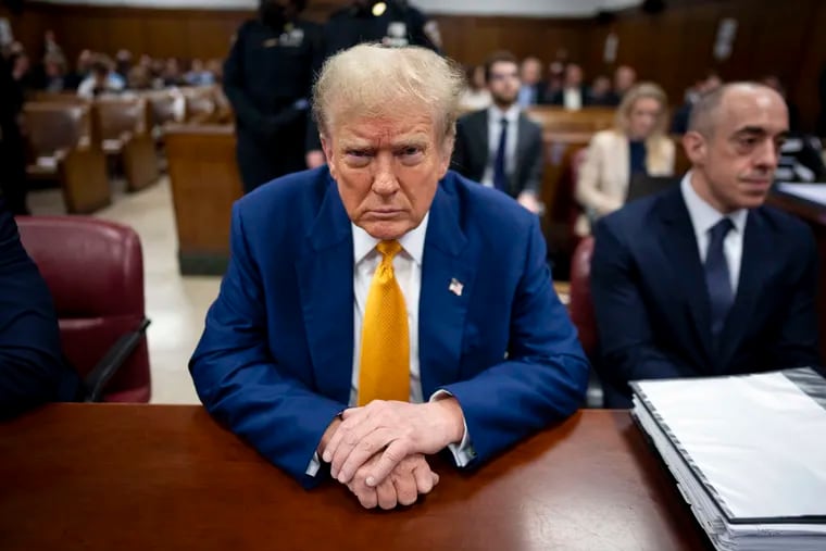Republican presidential candidate and former president Donald Trump awaits the start of proceedings for his trial at the Manhattan criminal court on Thursday, May 2, 2024.